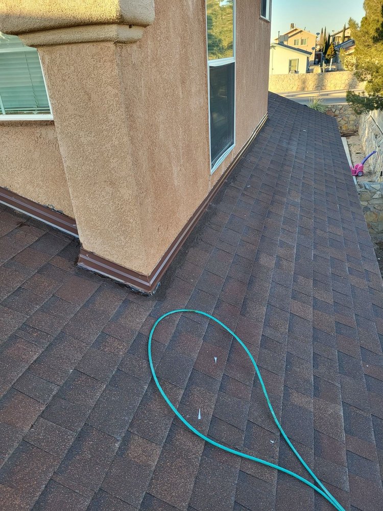 Slide of Mann & Sons Roofing