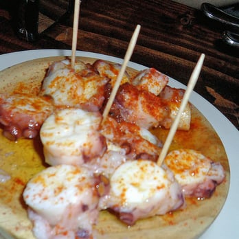 Nai - Pulpo A La Gallega (spanish octopus in virgin olive oil, sprinkled with sea salt and sweet paprika) - Tapas/Small Plates Near Me - New York, New York Nai - Pulpo A La Gallega (spanish octopus in virgin olive oil, sprinkled with sea salt and sweet paprika) - Tapas/Small Plates Near Me - New York, New York