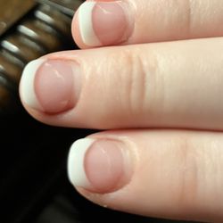 VIP Nails and Spa - Prior acrylic showing through fill.