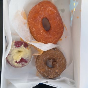 Round Rock Donuts - Glazed, Red Velvet, and Blueberry Donuts. The Glazed Donut definitely stood out and is absolutely amazing! - Bakeries Near Me - Round Rock, Texas