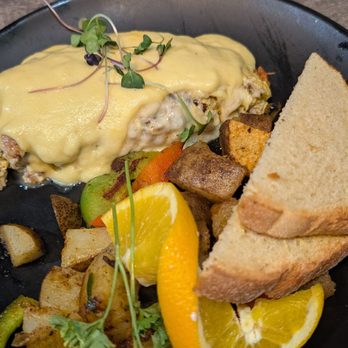 Mario's Early Toast - Omelette with Hollandaise sauce and house potatoes, my friend said it was very good. She orders this all the time. - Breakfast & Brunch Near Me - Rocklin, California
