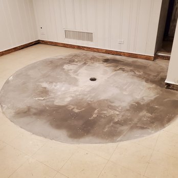 Cornerstone Roofing and Masonry - "After" photo. Filled and drain left intact! Drying, and ready for the floor to be laid over this level area! - Roofing Near Me
