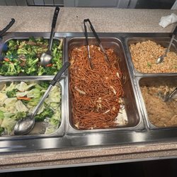 Selection of vegetables and noodles and fried rice