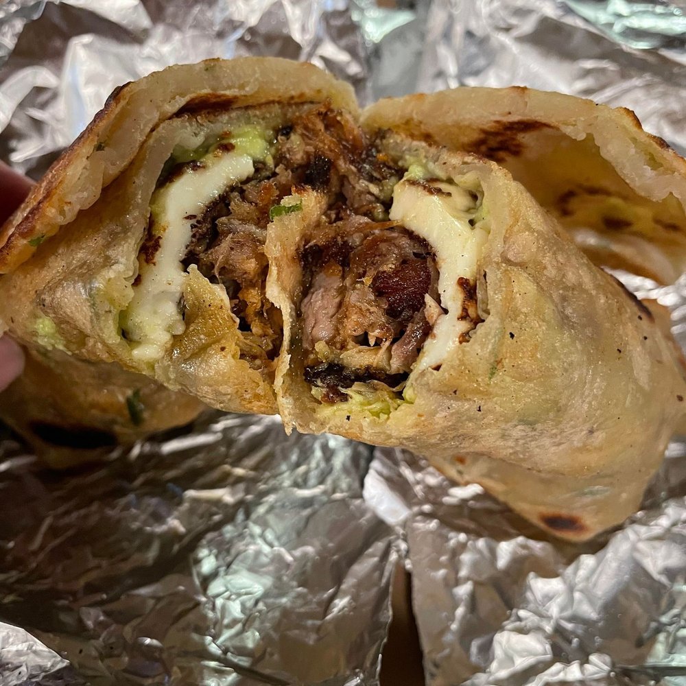 Forsyth Fire Escape - Scallion burrito inside view - Asian Fusion Near Me - New York, New York Forsyth Fire Escape - Scallion burrito inside view - Asian Fusion Near Me - New York, New York