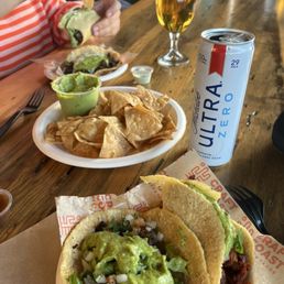 Tacos + chips n guac. This is false advertising cuz they DO NOT sell n/a beer