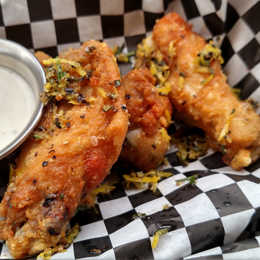 Fuego's Saloon - Lemon Pepper Wings. They use fresh grated lemon rinds! - Cocktail Bars Near Me - Houston, Texas Fuego's Saloon - Lemon Pepper Wings. They use fresh grated lemon rinds! - Cocktail Bars Near Me - Houston, Texas