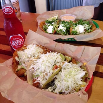 Cabo Bob's Burritos - Deluxe fish tacos and pork tacos. Bottled big red was great! - Tacos Near Me - Austin, Texas