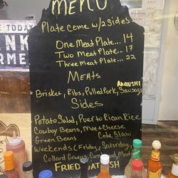 Juan & Allie's BBQ - Menu and hot sauce table