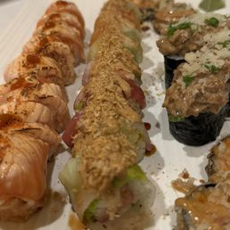 Lr salmon dynamite, 7 fishes, crunchy salmon and godzIlla rolls