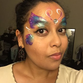 Rainbow Painted Smiles - She has great colors, glitters, crystals and a very fast, talented hand! Work is still intact after long day. - Face Painting Near Me Rainbow Painted Smiles - She has great colors, glitters, crystals and a very fast, talented hand! Work is still intact after long day. - Face Painting Near Me