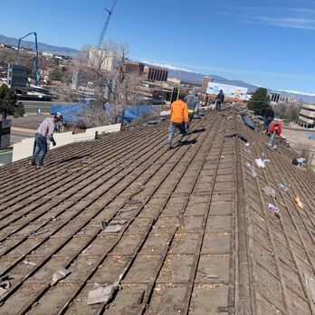 McCanan Construction - workers working on a roof - Roofing Near Me - Aurora, Colorado McCanan Construction - workers working on a roof - Roofing Near Me - Aurora, Colorado