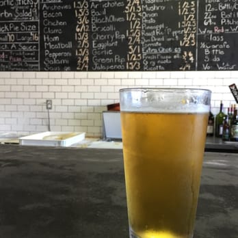 URBN - Their own brew in front of the menu - Pizza Near Me - Vista, California URBN - Their own brew in front of the menu - Pizza Near Me - Vista, California