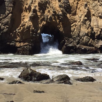 Pfeiffer Beach - One of the rock formations, key hole - Beaches Near Me - Big Sur, California Pfeiffer Beach - One of the rock formations, key hole - Beaches Near Me - Big Sur, California