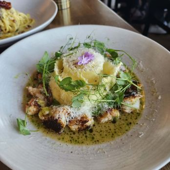 OLIVIA - Shrimp ravioli. What a beautiful presentation. It comes rolled up in a long strip instead of small pockets. Made fresh in house daily. - Italian Near Me - Tampa, Florida