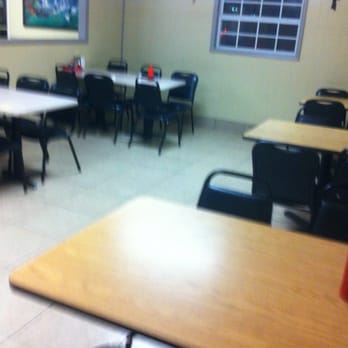 Mama's Kitchen - a dining room with tables and chairs - Soul Food Near Me - Cut Off, Louisiana