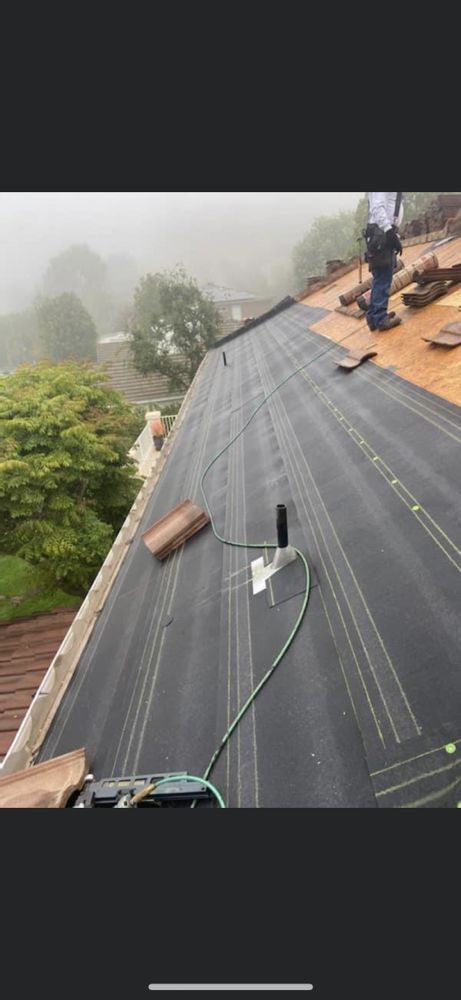 Slide of AAA Roofing Services