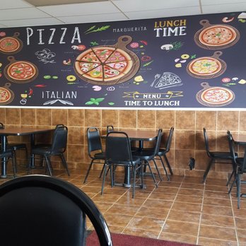 Gage Pizza & Wings - a restaurant with tables and chairs - Pizza Near Me - Hamilton, Ontario Gage Pizza & Wings - a restaurant with tables and chairs - Pizza Near Me - Hamilton, Ontario