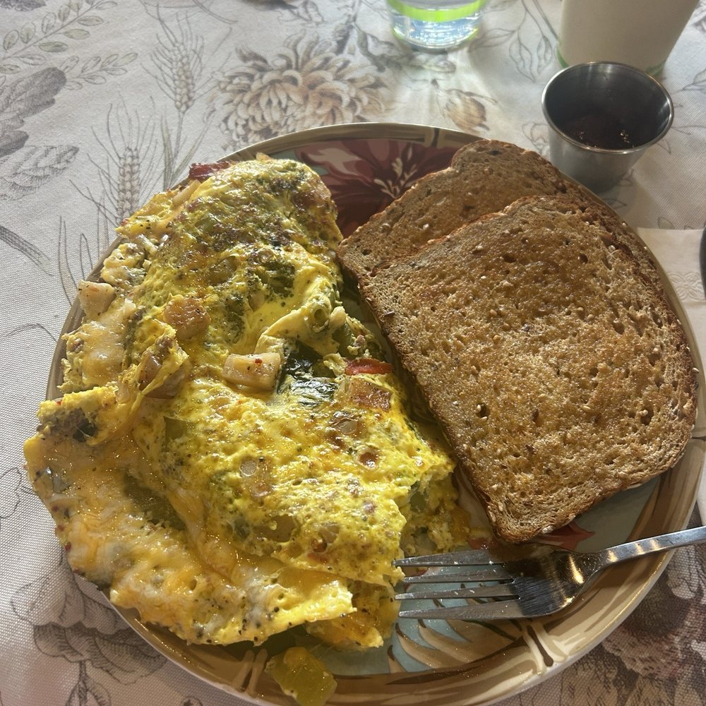 I had the farmers omelette. All the plates come teaming with food. Very good. I had the farmers omelette. All the plates come teaming with food. Very good.