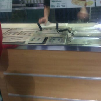 Subway - a man standing in front of a counter - Sandwiches Near Me - River Rouge, Michigan Subway - a man standing in front of a counter - Sandwiches Near Me - River Rouge, Michigan
