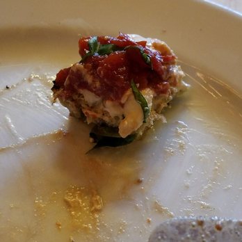Krust Pizza & Bourbon Bar - What was left of the bruschetta before Egan even tried a bite... - Pizza Near Me - Middletown, Connecticut