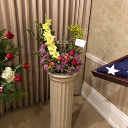 Tiny wilted arrangement $80