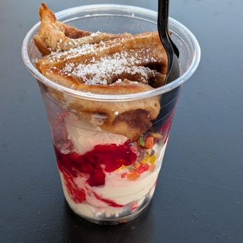 Cravings Ice Cream - Waffle Bites with Strawberry Cheesecake Ice Cream, Fruity Pebbles toppings, and Strawberry Drizzle. Not that much better :/ - Ice Cream & Frozen Yogurt Near Me - Bellflower, California