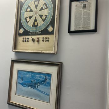 Apron Cafe - a dart board and a dart board on a wall - Breakfast & Brunch Near Me - Hammonton, New Jersey
