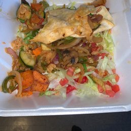 This was supposed to be a veggie burrito, Who puts carrots and celery and horribly overcooked rice in a soggy burrito? Unacceptable.