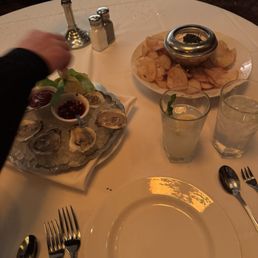 Fresh Oysters on the Half shell (6) & Caviar and Caramelized Onion Dip with Housemade Chips Fresh Oysters on the Half shell (6) & Caviar and Caramelized Onion Dip with Housemade Chips