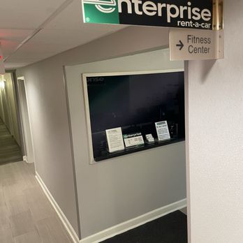 Enterprise Rent-A-Car - The Enterprise Rent-A-Car window inside the SpringHill Suites, after closing time - Car Rental Near Me - Herndon, Virginia Enterprise Rent-A-Car - The Enterprise Rent-A-Car window inside the SpringHill Suites, after closing time - Car Rental Near Me - Herndon, Virginia