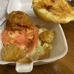 a sandwich in a styrofoam container