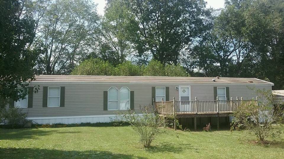 Slide of Burkett Brothers Metal Roofing