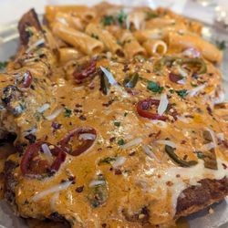 Red Volpe - Bone-in veal chop with spicy vodka sauce