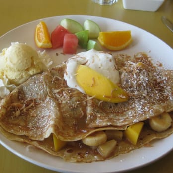 Blossom Bee - TROPICANA CREPE WITH PINEAPPLE, BANANA, MANGO, CARAMEL SAUCE, TOASTED COCONUT, CREME FRAICHE, VANILLA ICE CREAM & WHIPPED CREAM - Creperies Near Me - Dublin, California Blossom Bee - TROPICANA CREPE WITH PINEAPPLE, BANANA, MANGO, CARAMEL SAUCE, TOASTED COCONUT, CREME FRAICHE, VANILLA ICE CREAM & WHIPPED CREAM - Creperies Near Me - Dublin, California