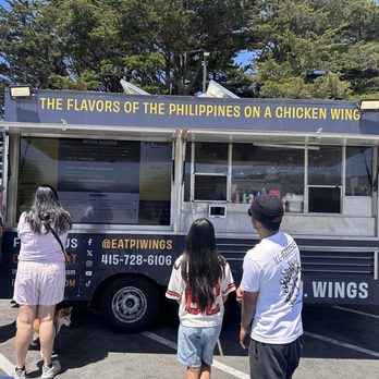 PI Wings - Outside with seating tables available - Chicken Wings Near Me PI Wings - Outside with seating tables available - Chicken Wings Near Me