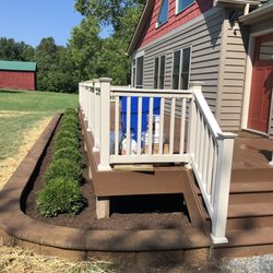 Green Acres - Front porch with boxwood bushes.