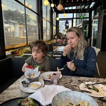 Earls Kitchen + Bar - Mac'n cheese french fries with cheese onions broccoli and some of the restaurant - New American Near Me - McLean, Virginia Earls Kitchen + Bar - Mac'n cheese french fries with cheese onions broccoli and some of the restaurant - New American Near Me - McLean, Virginia