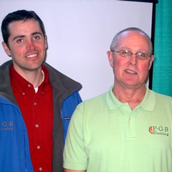 PGB Flooring - two men standing in front of a projector screen - Flooring Near Me PGB Flooring - two men standing in front of a projector screen - Flooring Near Me