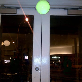 Greenlight Bookstore - A green light dangles above at the entrance - Bookstores Near Me - Brooklyn, New York