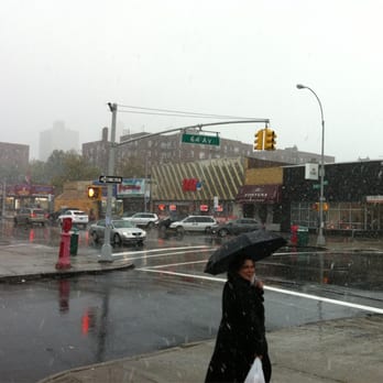 108 Stop N Go Convenience Incorporated - a woman walking in the rain - Convenience Stores Near Me - Forest Hills, New York 108 Stop N Go Convenience Incorporated - a woman walking in the rain - Convenience Stores Near Me - Forest Hills, New York