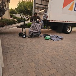 Torres Hauling & Services - Safely moving furniture from the truck into your home