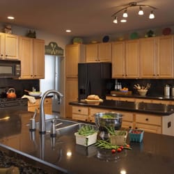 Granite Transformations of Seattle - Nero Galaxy counters and Honey Apple cabinet refacing