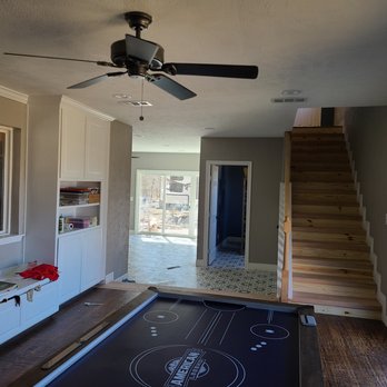 Good Home Concepts - a living room with a ceiling fan - General Contractors Near Me Good Home Concepts - a living room with a ceiling fan - General Contractors Near Me