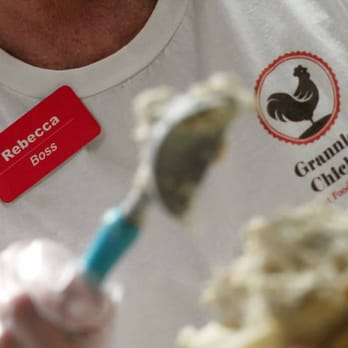 Grannies Chicken - a man holding a spoon with a spoonful of cream - Food Trucks Near Me - Jacksonville, Florida Grannies Chicken - a man holding a spoon with a spoonful of cream - Food Trucks Near Me - Jacksonville, Florida