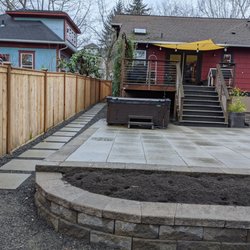 Rainier Rockeries - Paver patio with retaining wall and built in planter