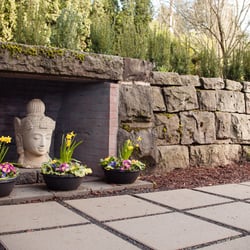 Jade River Healing Arts Center - Kwan Yin watches over our patio