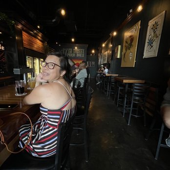 17th Street Public House - a woman sitting at a bar - Pubs Near Me - Merced, California 17th Street Public House - a woman sitting at a bar - Pubs Near Me - Merced, California