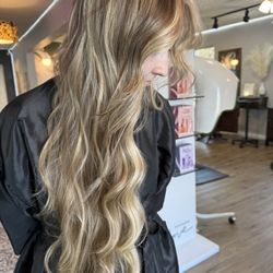 Salon One 21 - Sun-kissed and seamless! This blonde balayage is serving dimension, brightness, and that effortless glow. Who else loves a lived-in blonde?