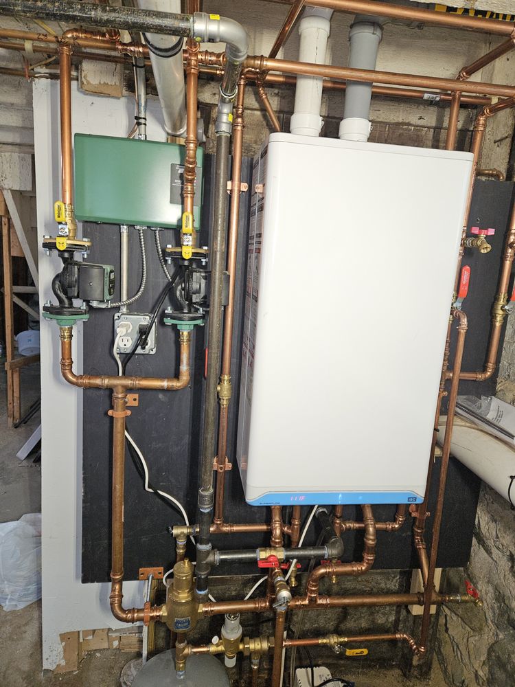 Slide of Greg Plumbing and Heating