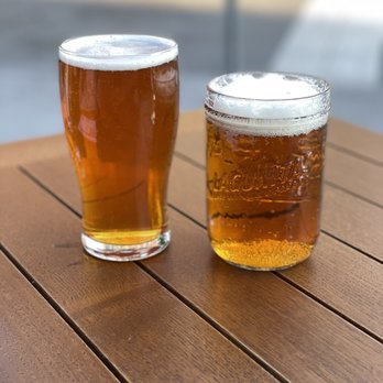 Hudson Hound - two glasses of beer on a table - Irish Near Me - Jersey City, New Jersey Hudson Hound - two glasses of beer on a table - Irish Near Me - Jersey City, New Jersey